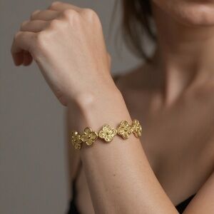 73. Brass clover bracelet